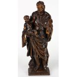 Continental Santos figural group, depicting Joseph with the infant Jesus, rising on a stepped