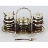 Georgian style silverplate condiment server by John Grinsell & Sons, consisting of a barrel form