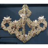 Grotto style custom shell encrusted chandelier, each of the five arms covered in various styles of