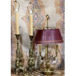 (lot of 3) Table lamp group, consisting of a pair of Gothic Revival style bronze candle prickets,