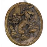 Continental bronze relief plaque, possibly German, the oval form depicting a hound carrying a