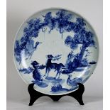 Chinese underglazed blue porcelain chrager, the interior with a pair of deer and cranes under pine