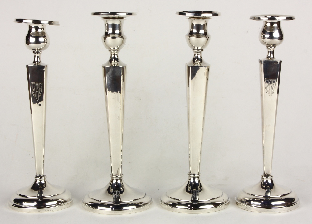 (lot of 4) Sterling weighted candlestick group, consisting of (2) pairs of sterling silver