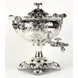 Rococo style silver plate hot water urn, having a compressed melon form, with double scrolled