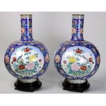 (lot of 2) Chinese Canton enameled stick neck vases, each globular body with butterfly-and-peony