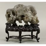 Chinese scholar's rock, the gray matrix of arch form with various apertures, with wood stand, 11.