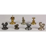 (lot of 7) Chinese silver finials, consisting of four fu-lions, two phoenix and one figure, some