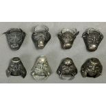 (lot of 8) Chinese silver hat ornaments, two in the form of a boar with movable ears; the rest in