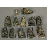 (lot of 12) Chinese silver hat ornaments, each featuring Shoulao, most holding a staff and