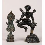 (lot of 2) Asian bronze sculptures: the first, a Chinese Northern Wei style Buddha backed by a