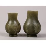 (lot of 2) Chinese jade/hardstone vases, of hu form carved with taotie in low relief, larger: 3.25"