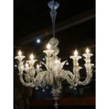 Large Italian Murano chandelier, having ten lights, each with floral reserves and leaf forms,