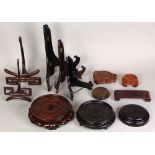 Two boxes of Chinese stands, of various forms including bases and plate stands, 9.5"w