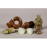 (lot of 7) Chinese hardstone carvings, consisting of two pebbles; a kneeling figure; a pig; a