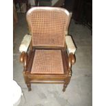 A Carters Ltd commode chair with cane seat