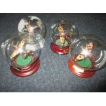4 model WWII aeroplanes in glass ball display cases