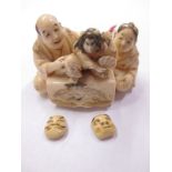 A 19th Century carved ivory Netsuke in the form of 2 puppeteers, still retaining the original