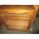 A small waxed pine bookcase