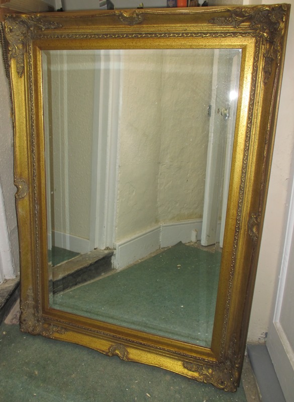 A gilt framed wall mirror, approx size 112x80cm