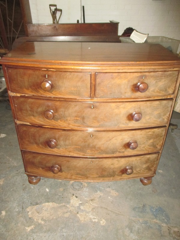 A 19th century bow front chest of drawers