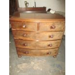 A 19th century bow front chest of drawers