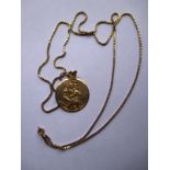 An 18ct gold St Christopher pendant on a 9ct gold chain, approx. weight 6g 18ct 4g 9ct