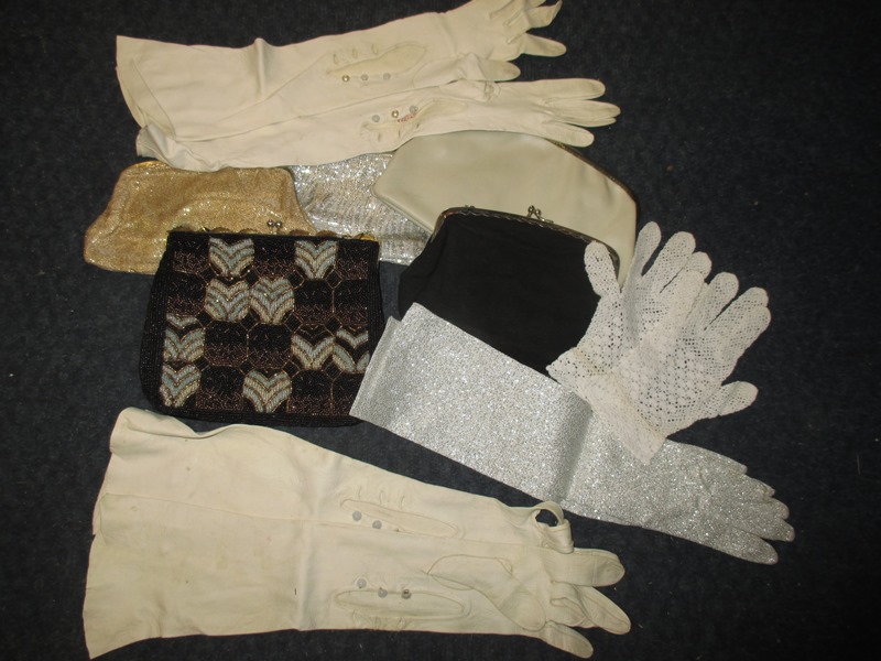 A quantity of vintage evening clutch bags and gloves