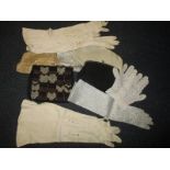 A quantity of vintage evening clutch bags and gloves