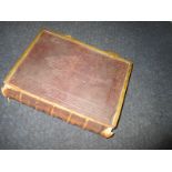 A leather bound and brass clasped Victorian Family bible, dated 1864