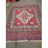 A vintage Kilim rug