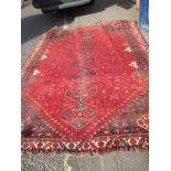 A large vintage red rug