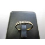 A 9ct gold diamond simulant ring