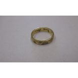 An 18ct gold wedding band, approx. weight 3.8g