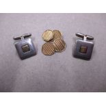 A pair of 9ct gold cufflinks, approx weight 3.5g and a silver pair