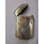 A Victorian sterling silver vesta case inlaid with gold