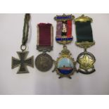 A German Iron Cross, British regular army service medal and two Buffalo medals