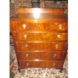 A chest of 5 graduated drawers
