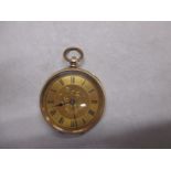 A gold cased pocket watch marked 14k to outer case