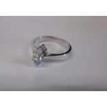 An 18ct white gold diamond solitaire ring the stone being marquise brilliant