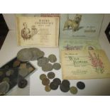 A quantity of coins, trade tokens and cigarette cards