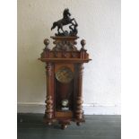 An Edwardian walnut 8 day wall clock