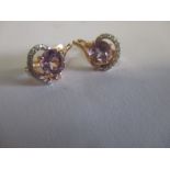 A pair of 14ct gold earrings