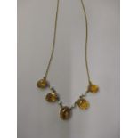 A 9ct gold necklace set with citreen and seed pearls
