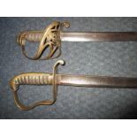A pair of antique military officers swords
