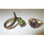 An unusual enamelled 9ct gold ring in the form of a sea serpent and a diamond and amethyst ring