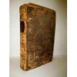 A 17th century leather bound book 'Poems on affairs of state' dated 1699