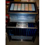 A 1970's Rock Ola 449 Jukebox and records