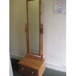 A pine cheval mirror with drawer unit to base