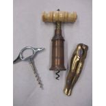 A 19th century corkscrew one other and a pair of legs nut crackers