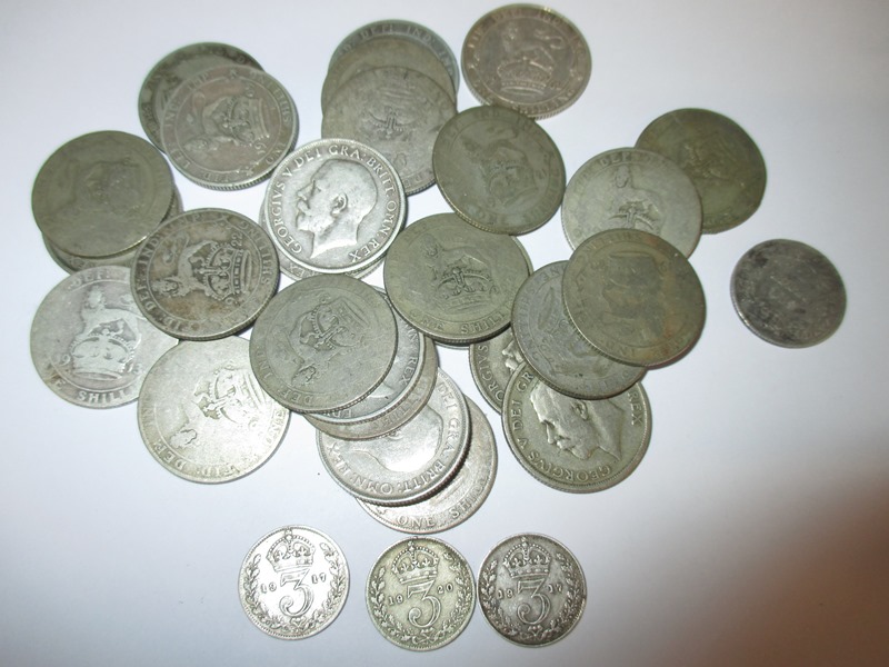 A quantity of silver shillings and 3d pieces